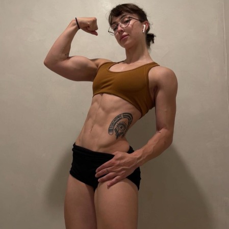 Lean Beef Patty has tattoos on her legs and abdomen.